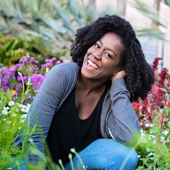 Author Tomi Adeyemi’s Reaction To Holding Her Book For The First Time Gives Us All The Feels
